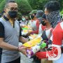 Ratusan Paket Sembako Dibagikan Ditlantas Polda Jatim, KBP Latif : Teruskan Cita-cita Pejuang Kepolisian
