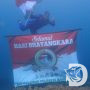Satpolair Polresta Banyuwangi Libatkan 12 Penyelam Kibarkan Bendera di HUT Bhayangkara ke-76