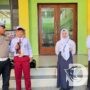 Satlantas Polres Mojokerto Sosialisasi Tertib Lalin dan Berbagi Helm